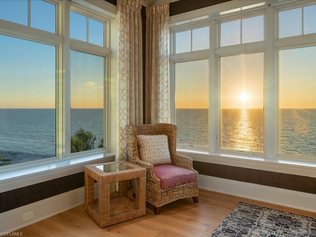 7409 Bay Colony Drive Naples, FL 34108 - Photo 22 of 48 a living room with furniture and a window