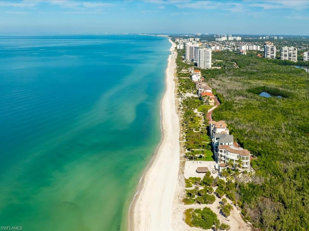 7409 Bay Colony Drive Naples, FL 34108 - Photo 46 of 48 a view of a lake