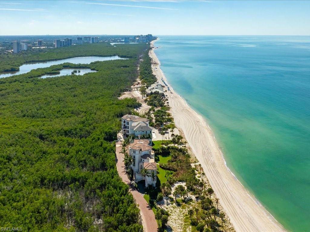 7409 Bay Colony Drive Naples, FL 34108 - Photo 47 of 48 a view of a lake with outdoor space