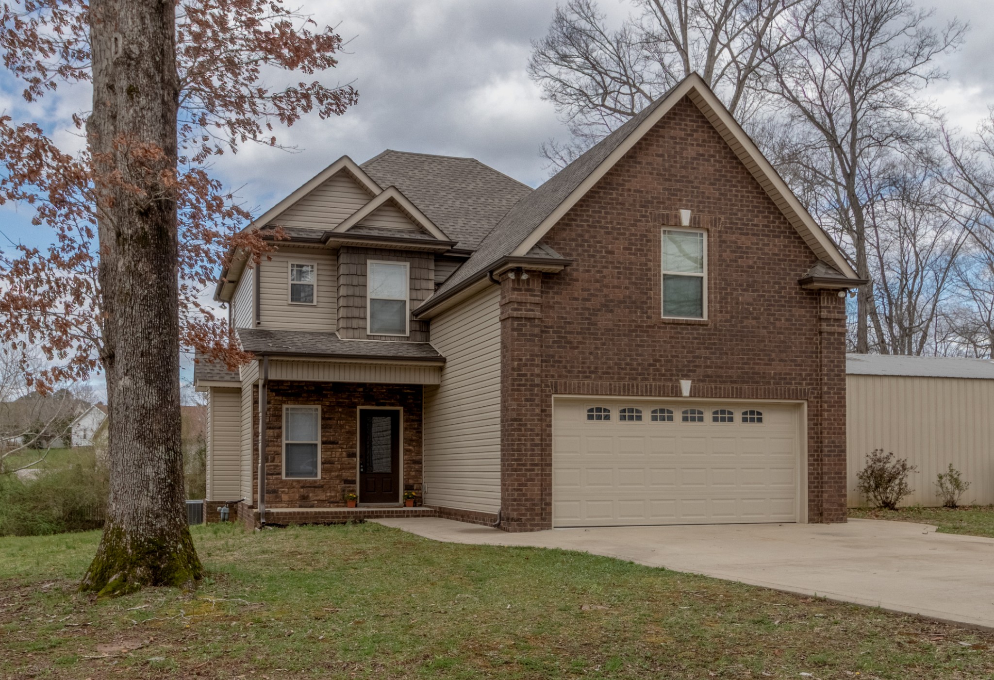 280 Harper Road Clarksville, TN 37043 - Photo 1 of 23 front view of a house with a yard