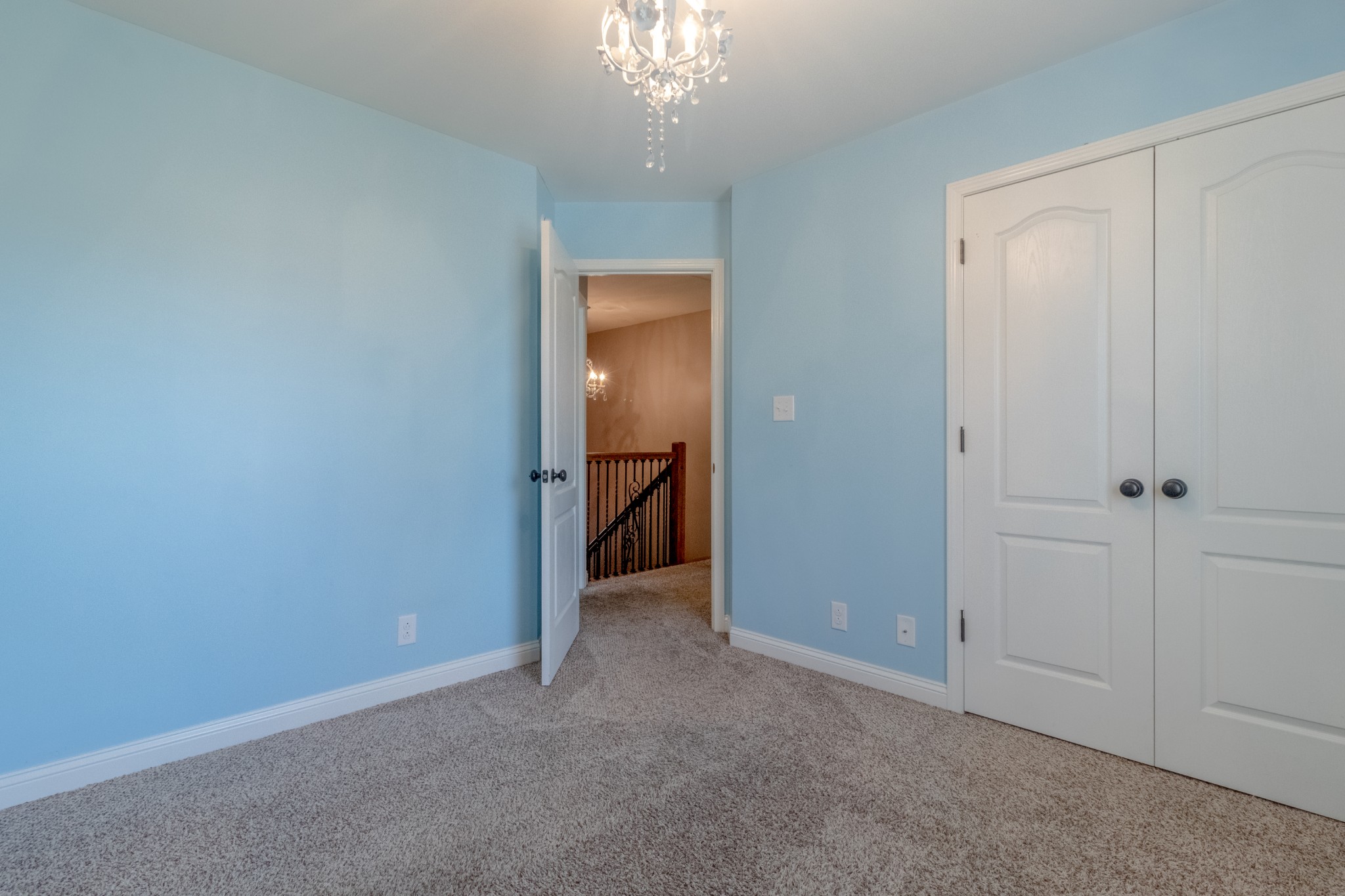 280 Harper Road Clarksville, TN 37043 - Photo 16 of 23 a view of an empty room with a chandelier fan