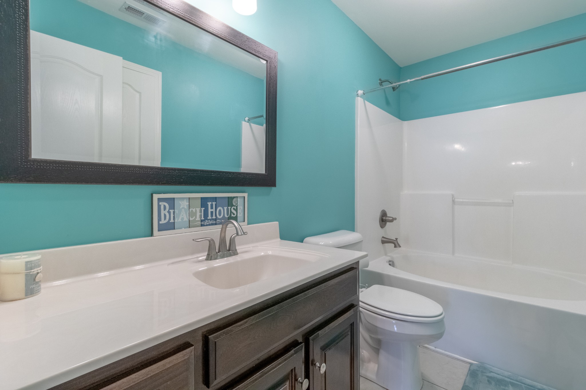 280 Harper Road Clarksville, TN 37043 - Photo 17 of 23 a bathroom with a sink and a mirror