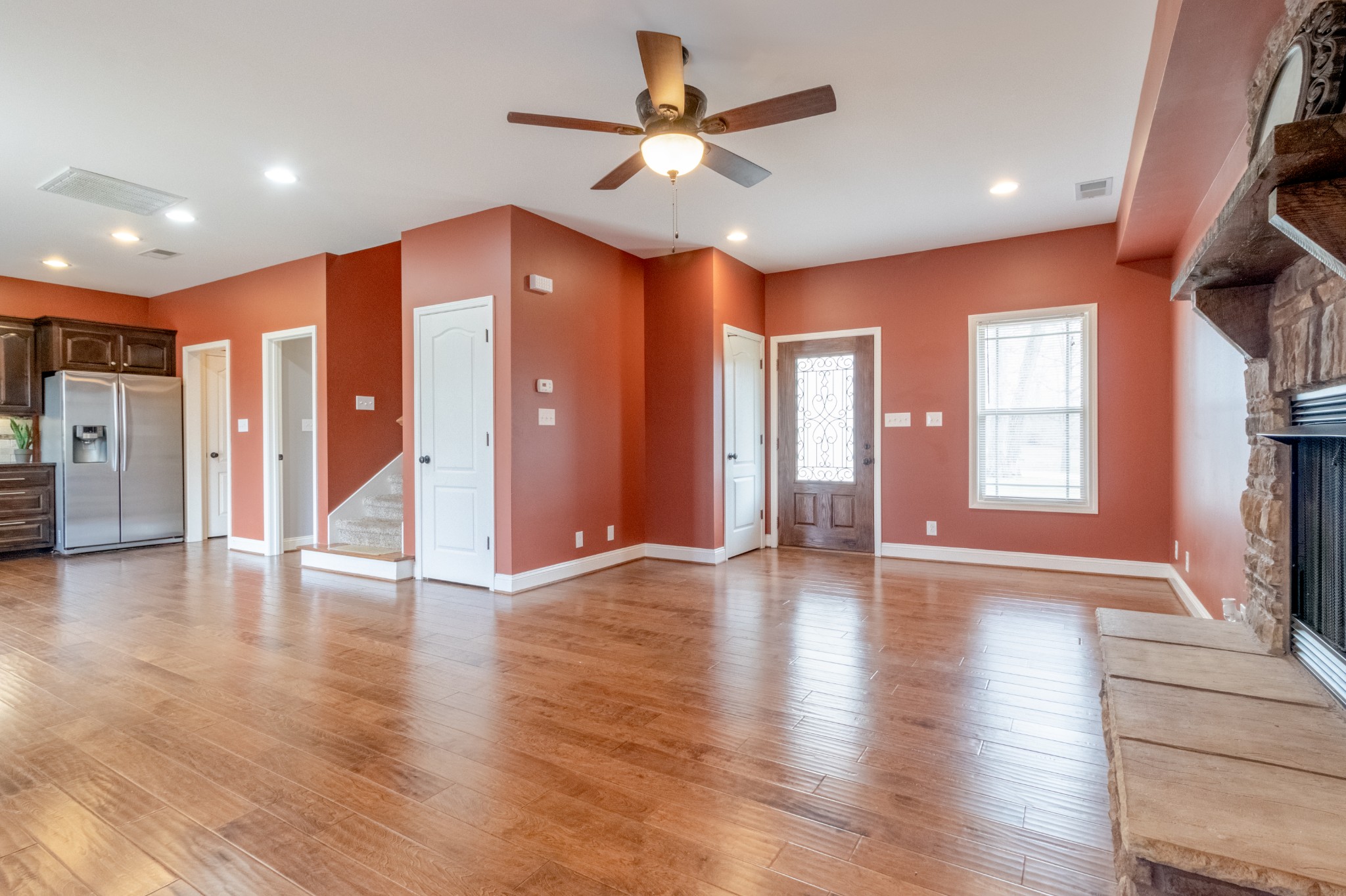 280 Harper Road Clarksville, TN 37043 - Photo 5 of 23 a view of an empty room with window and wooden floor