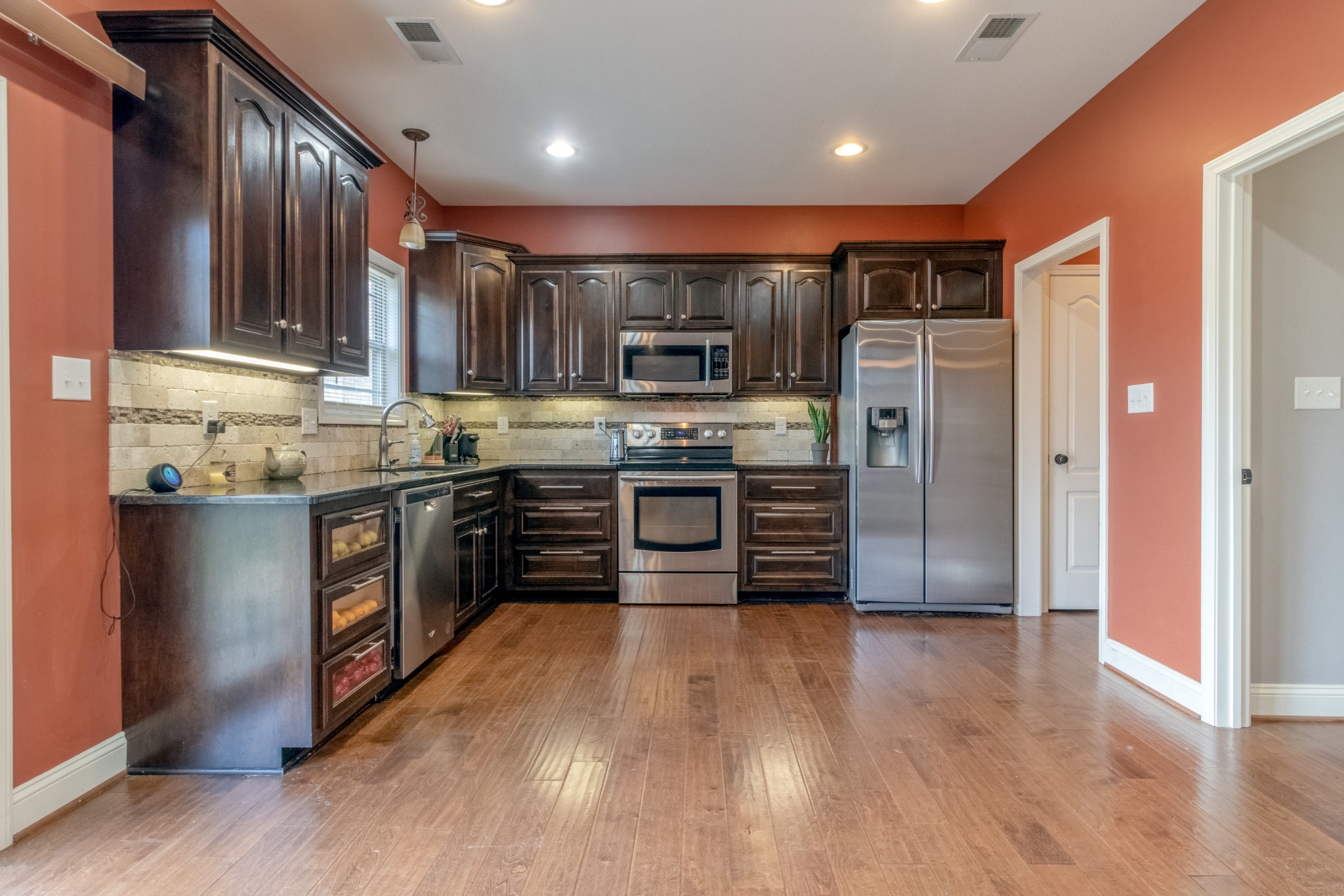 280 Harper Road Clarksville, TN 37043 - Photo 8 of 23 a kitchen with stainless steel appliances granite countertop a refrigerator a sink a stove and oven