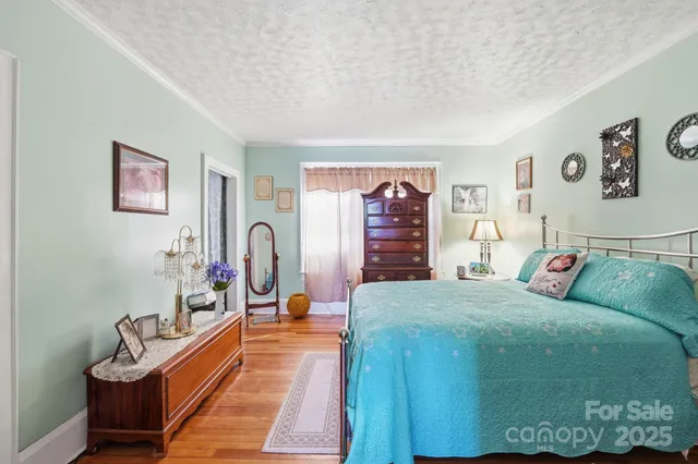 a bed room with a bed and with a couch