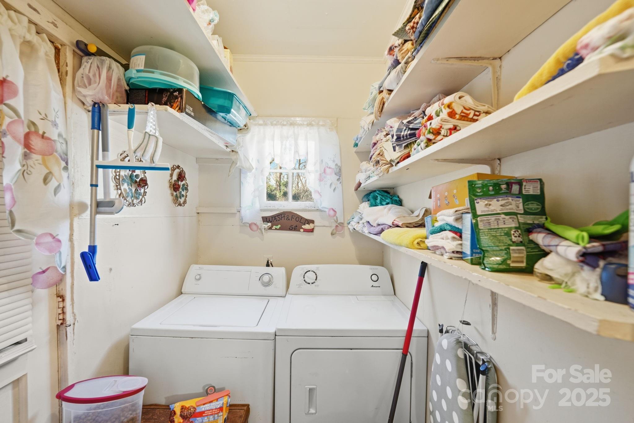 105 1st Street Rockingham, NC 28379 - Photo 25 of 28 a utility room with dryer and washer