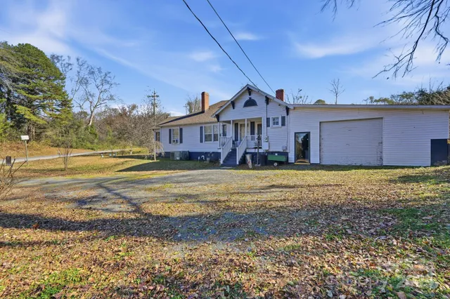 a view of a house with a big yard