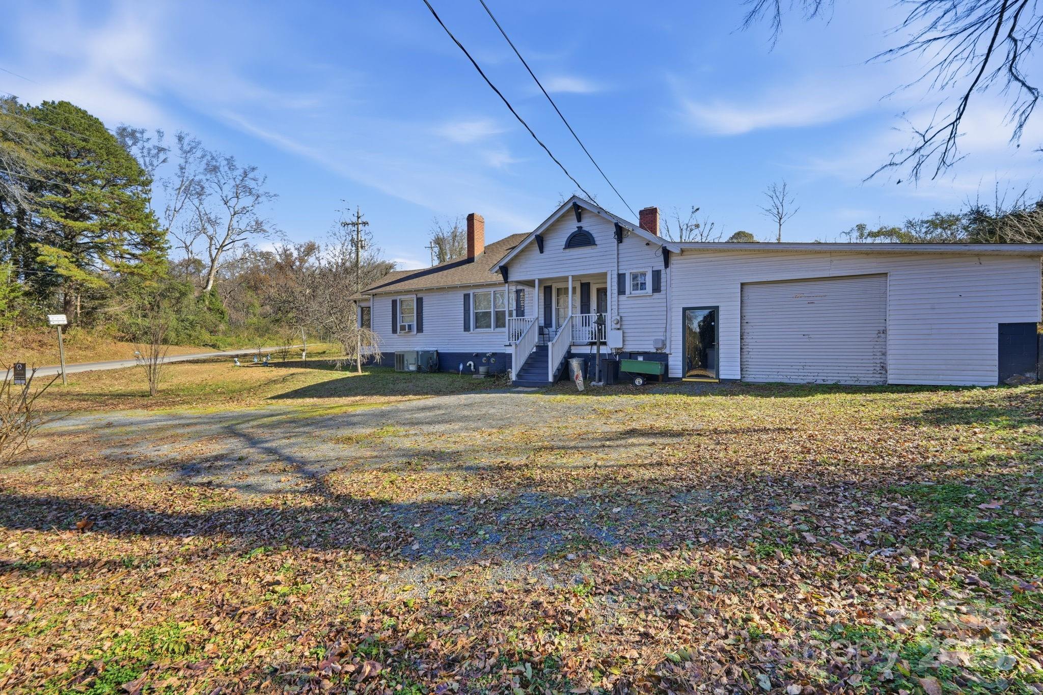 105 1st Street Rockingham, NC 28379 - Photo 27 of 28 a view of a house with a big yard