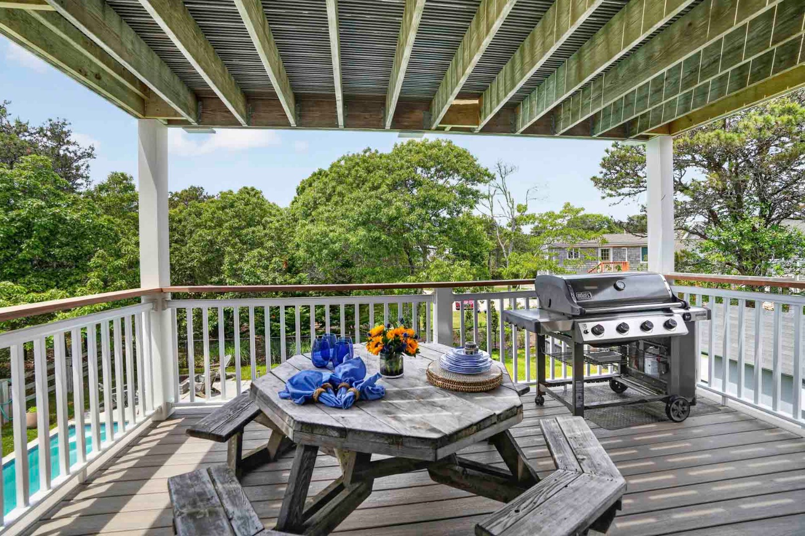 9 Thaxter Lane Edgartown, MA 02539 - Photo 13 of 53 a view of balcony with wooden floor and outdoor seating
