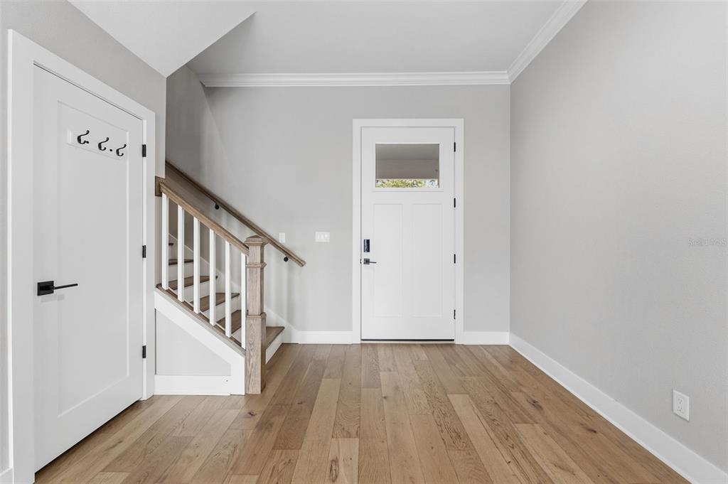 3314 West Villa Rosa Street Tampa, FL 33611 - Photo 13 of 55 wooden floor in a hallway with a wooden floor