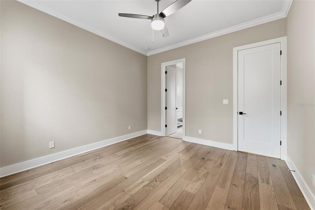 3314 West Villa Rosa Street Tampa, FL 33611 - Photo 22 of 55 wooden floor in an empty room