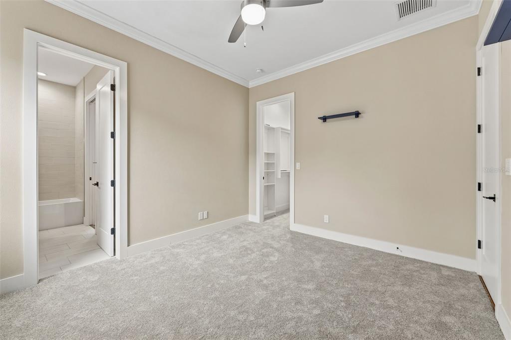3314 West Villa Rosa Street Tampa, FL 33611 - Photo 29 of 55 an empty room with fan and entrance