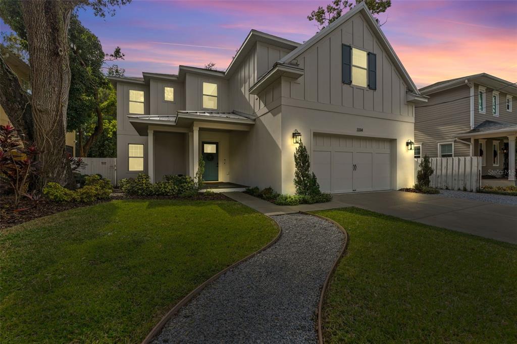 3314 West Villa Rosa Street Tampa, FL 33611 - Photo 3 of 55 a front view of a house with a garden