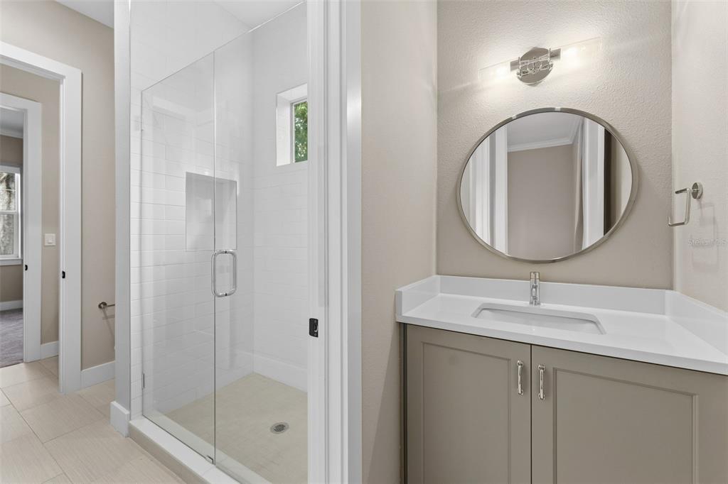 3314 West Villa Rosa Street Tampa, FL 33611 - Photo 32 of 55 a bathroom with a sink and a mirror