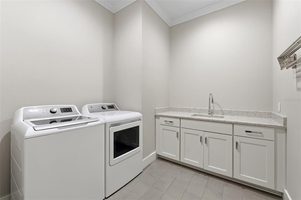 3314 West Villa Rosa Street Tampa, FL 33611 - Photo 37 of 55 a utility room with dryer and washer