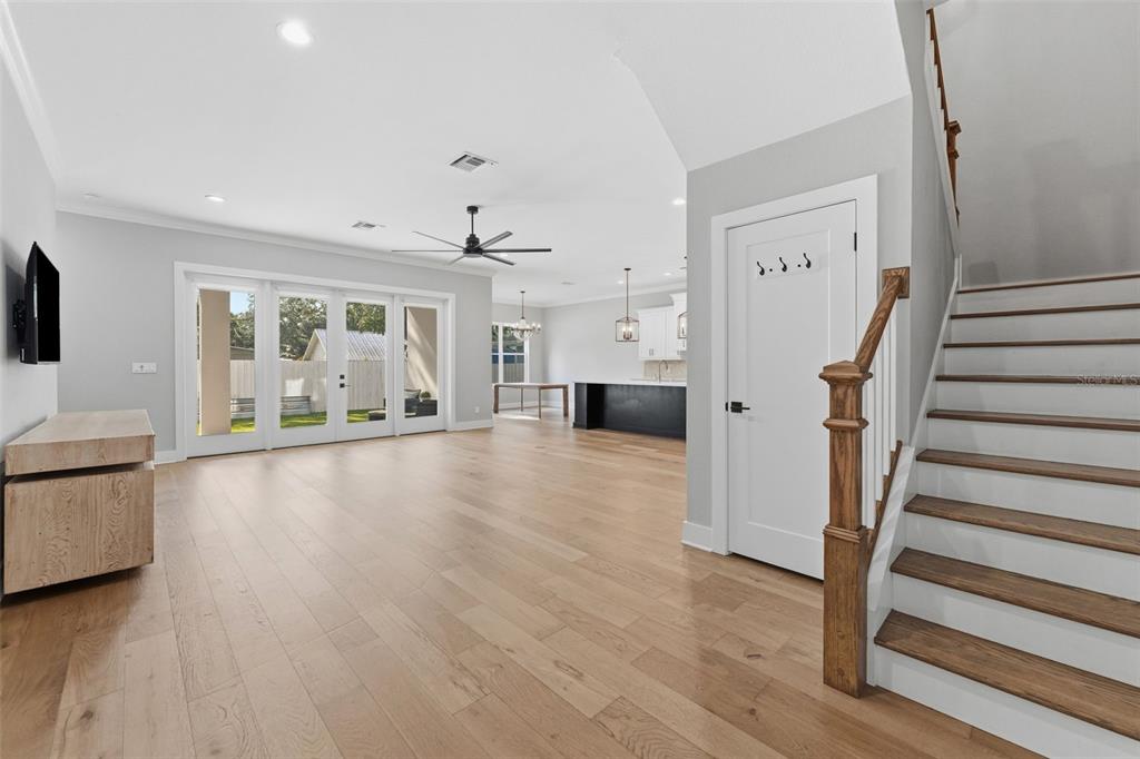 3314 West Villa Rosa Street Tampa, FL 33611 - Photo 4 of 55 a view of an empty room with wooden floor and a window