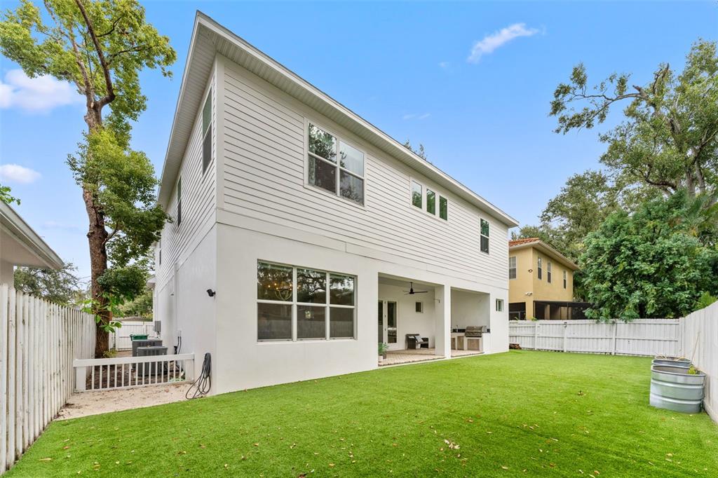 3314 West Villa Rosa Street Tampa, FL 33611 - Photo 41 of 55 a view of a house with a backyard
