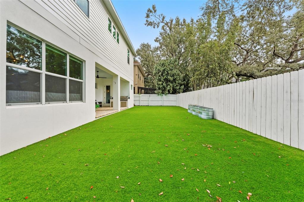 3314 West Villa Rosa Street Tampa, FL 33611 - Photo 42 of 55 a view of an house with backyard space and garden