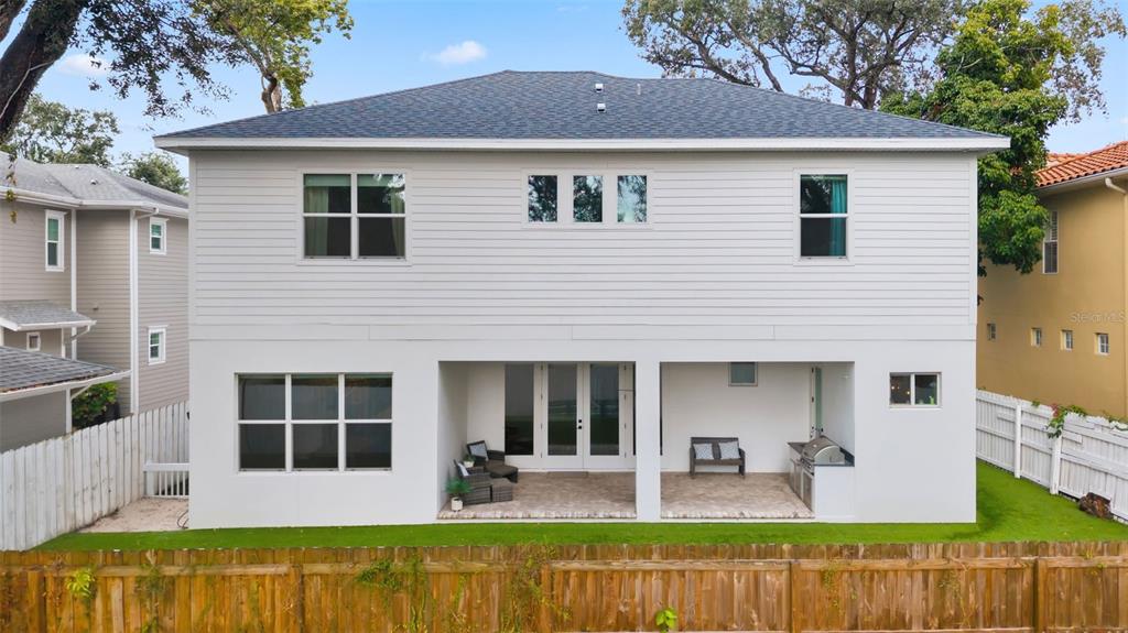 3314 West Villa Rosa Street Tampa, FL 33611 - Photo 51 of 55 a view of a house with swimming pool and porch
