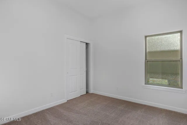 an empty room with a window