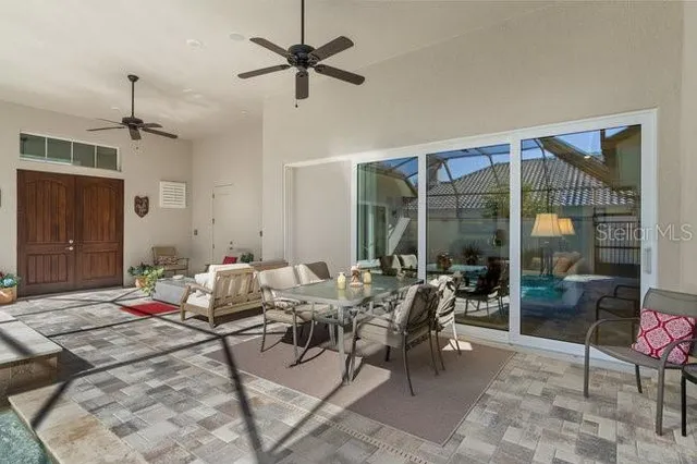 a view of a dining room with furniture window and outside view