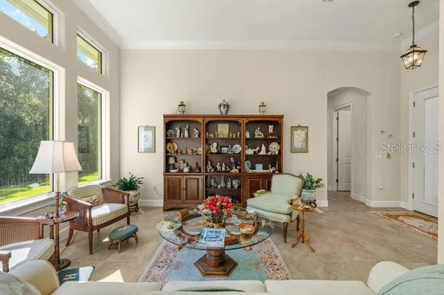 a large kitchen with a table and chairs