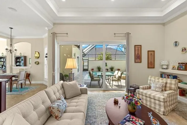 a living room with furniture and a rug