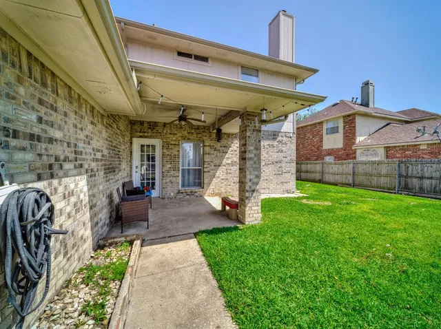a view of a porch with a backyard