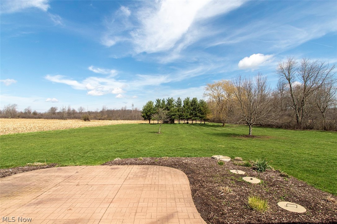 2201 Granger Road Medina, OH 44256 - Photo 27 of 34 View of green lawn featuring a patio area