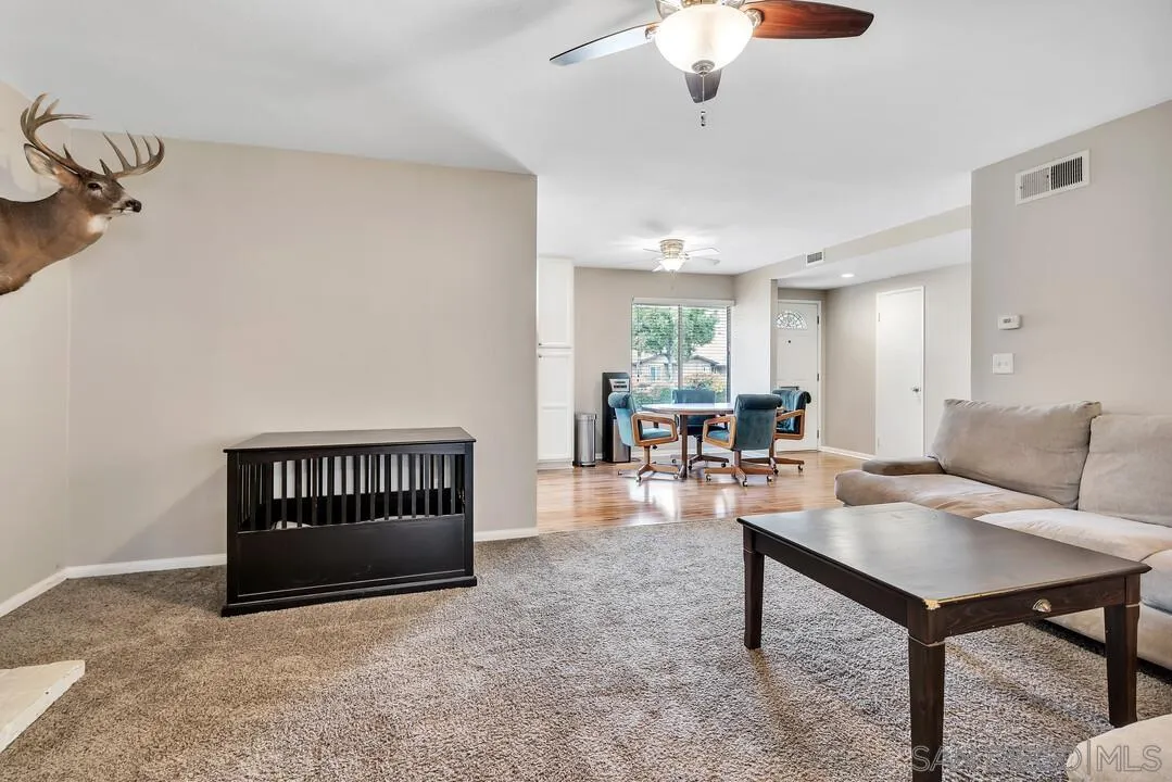 9677 Lutheran Way Santee, CA 92071 - Photo 11 of 33 a living room with furniture and a table