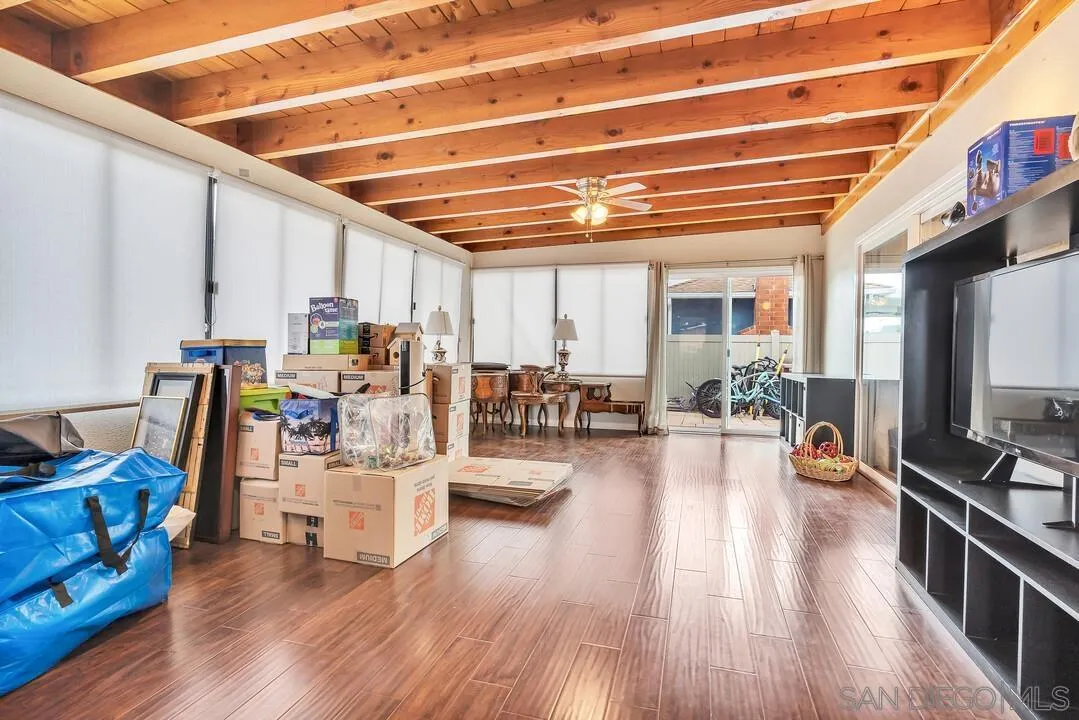 9677 Lutheran Way Santee, CA 92071 - Photo 13 of 33 a living room with furniture and a wooden floor
