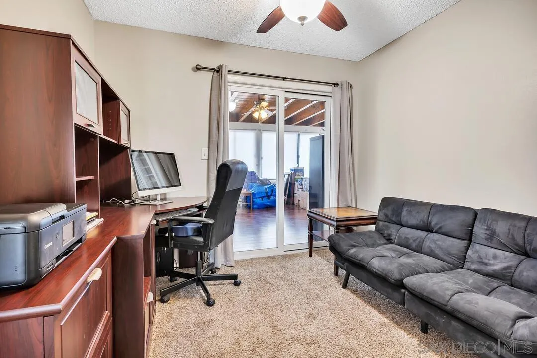 9677 Lutheran Way Santee, CA 92071 - Photo 16 of 33 a work room with furniture and a window