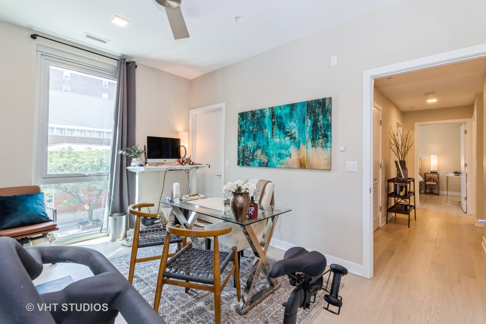 1000 West Monroe Street, Unit 201 Chicago, IL 60607 - Photo 17 of 20 a living room with furniture and a flat screen tv