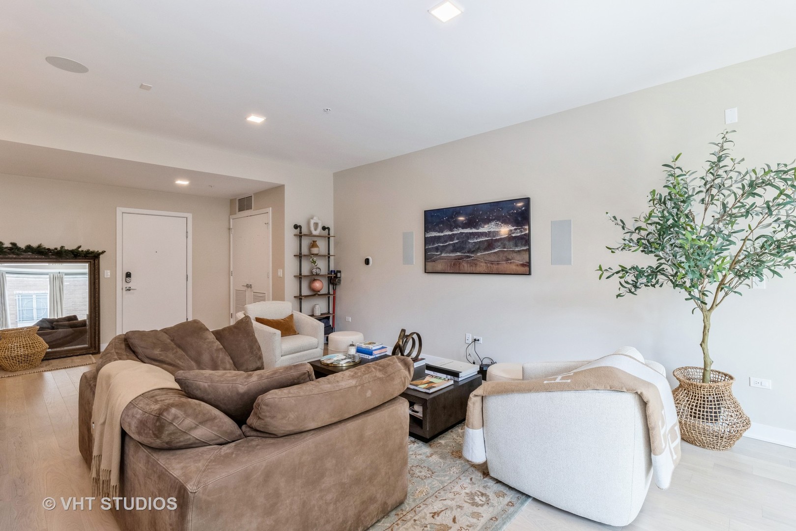 1000 West Monroe Street, Unit 201 Chicago, IL 60607 - Photo 7 of 20 a living room with furniture and a potted plant