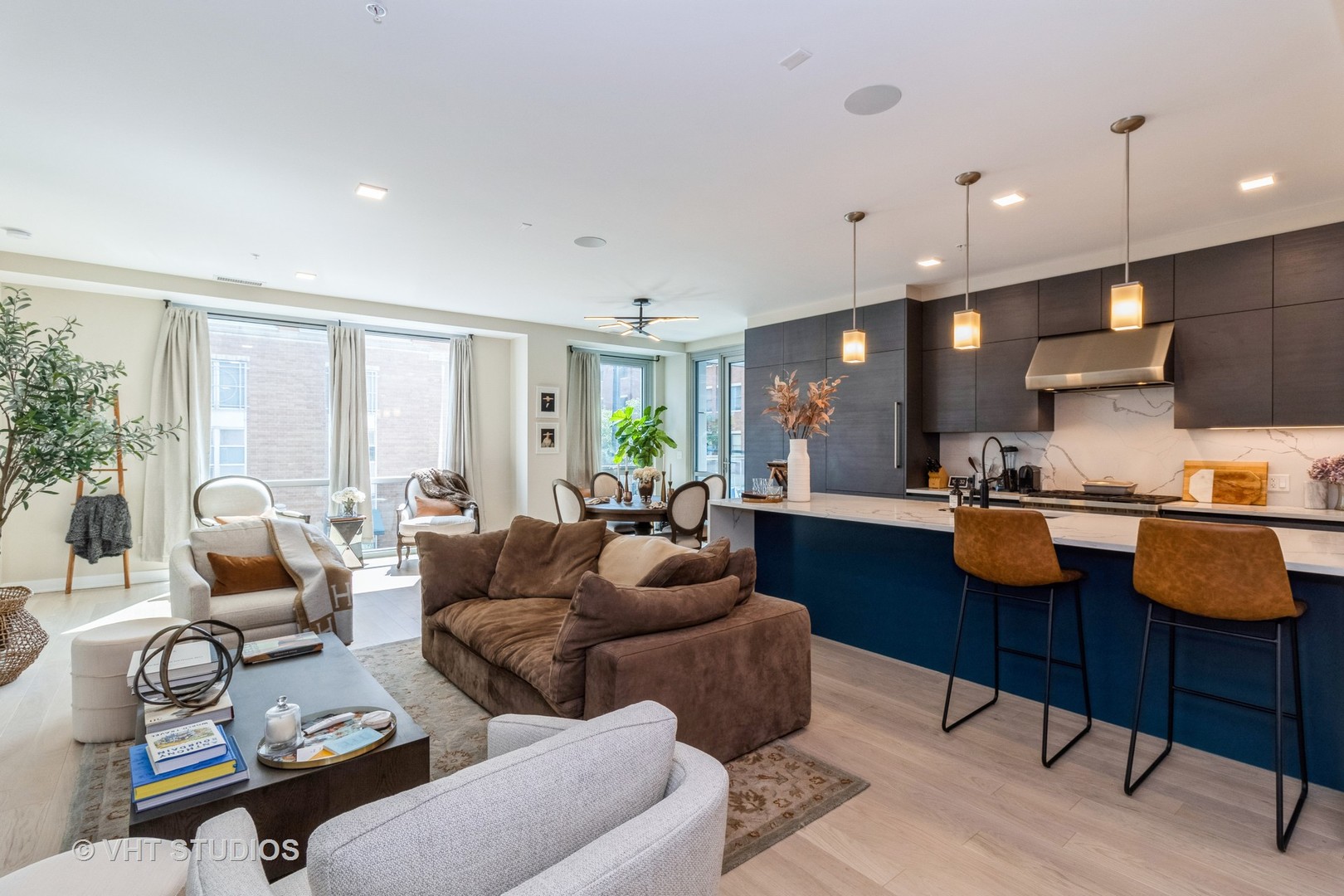 1000 West Monroe Street, Unit 201 Chicago, IL 60607 - Photo 8 of 20 a living room with furniture and a large window