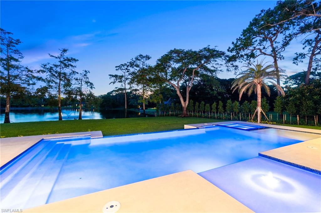 337 West Street Naples, FL 34108 - Photo 13 of 50 View of pool featuring a yard
