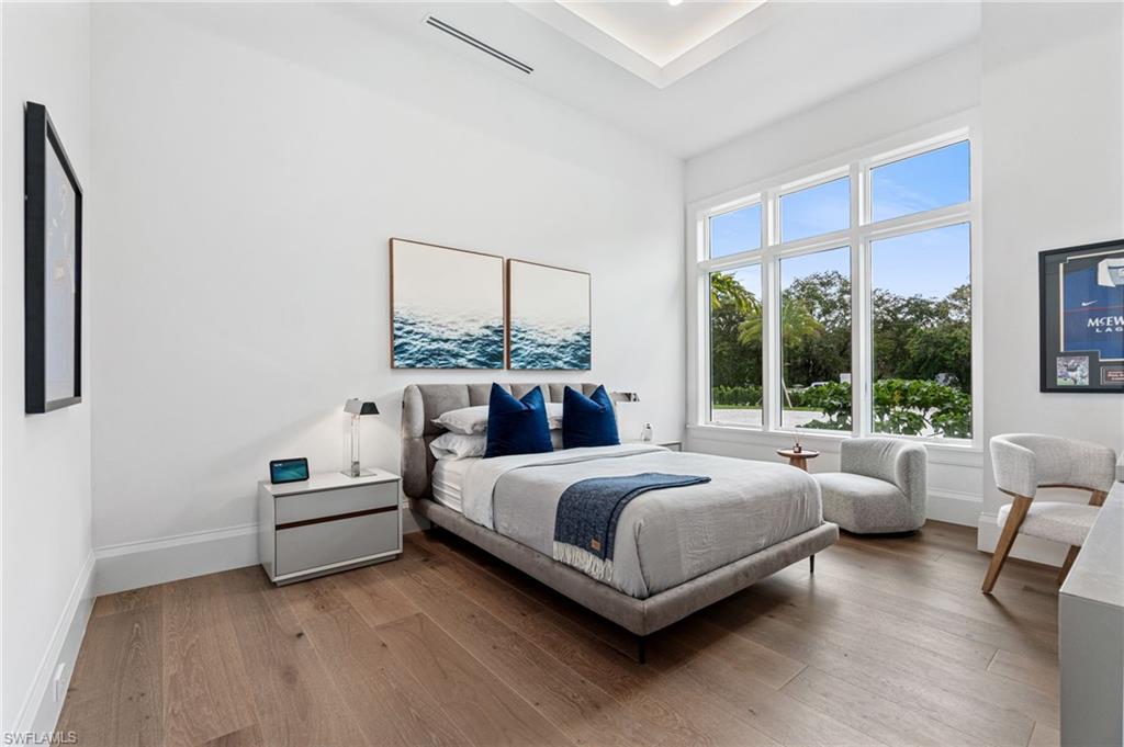 337 West Street Naples, FL 34108 - Photo 32 of 50 Bedroom featuring hardwood / wood-style flooring