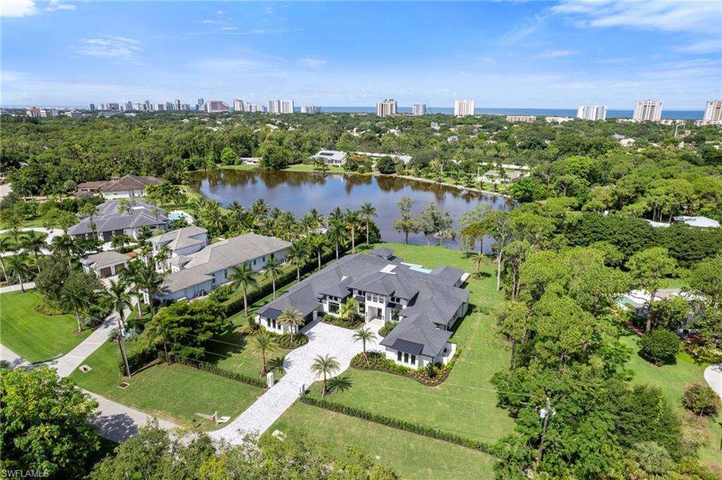 337 West Street Naples, FL 34108 - Photo 50 of 50 Birds eye view of property featuring a water view