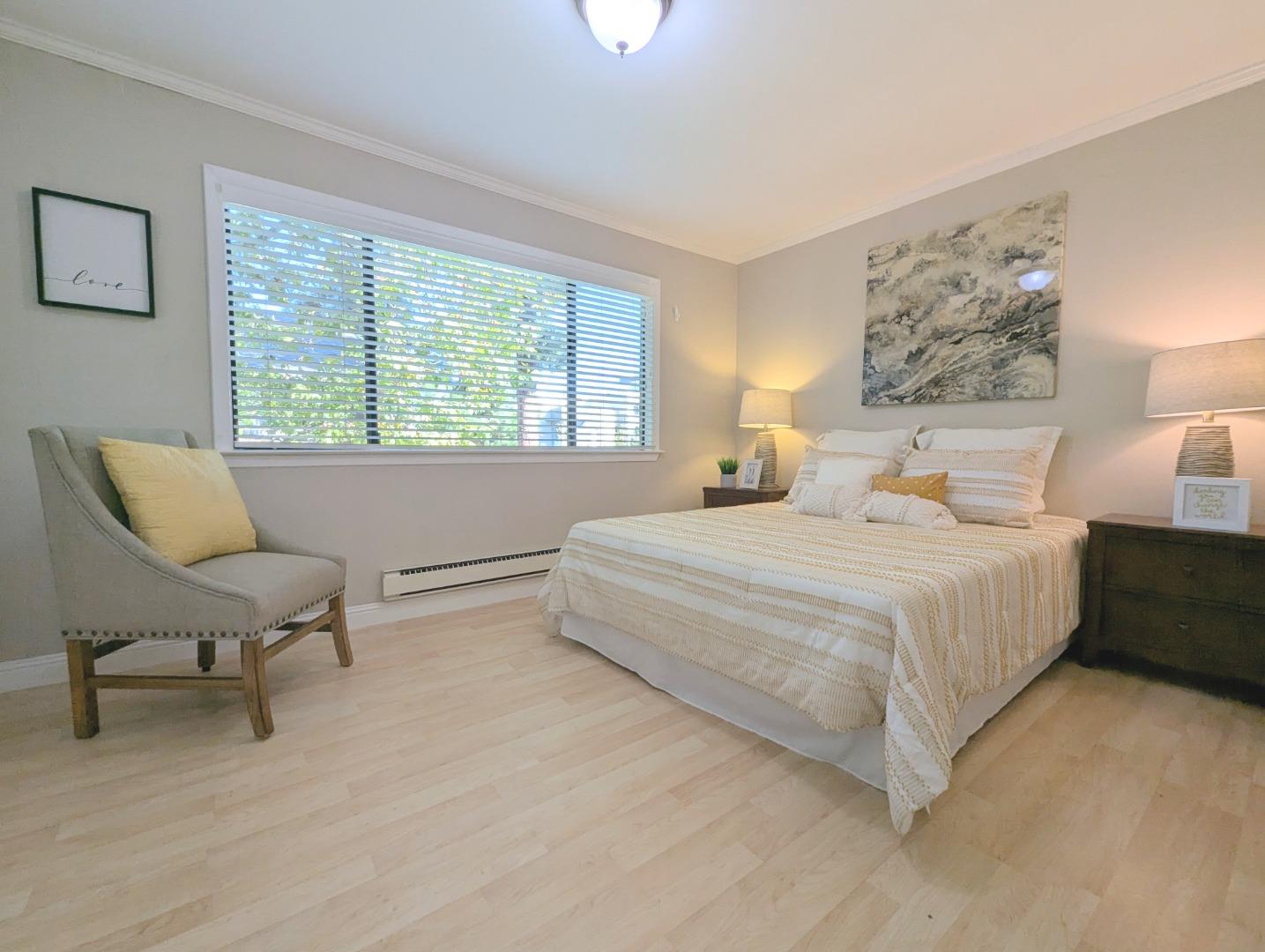 960 Kiely Boulevard, Unit F Santa Clara, CA 95051 - Photo 13 of 23 a bedroom with a bed and a couch