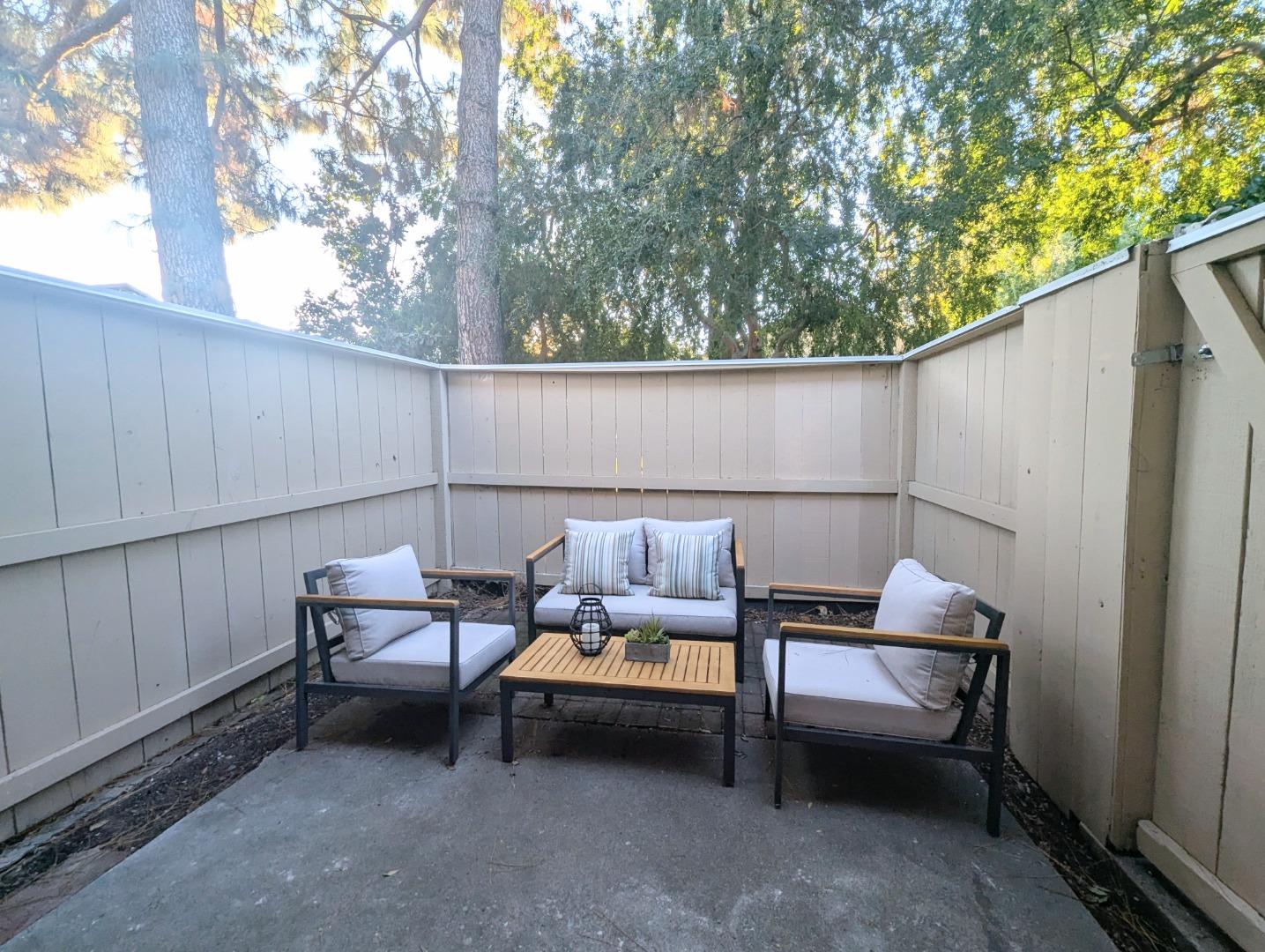 960 Kiely Boulevard, Unit F Santa Clara, CA 95051 - Photo 16 of 23 a backyard of a house with table and chairs