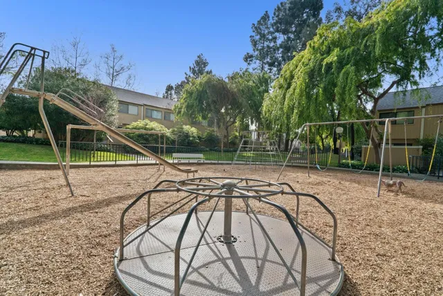 a view of a yard with a slide