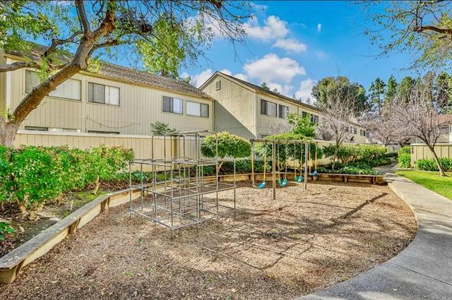 960 Kiely Boulevard, Unit F Santa Clara, CA 95051 - Photo 21 of 23 a backyard of a house with plants and trees