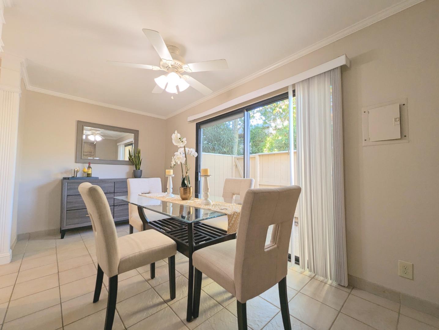 960 Kiely Boulevard, Unit F Santa Clara, CA 95051 - Photo 5 of 23 a dining room with furniture a chandelier and wooden floor