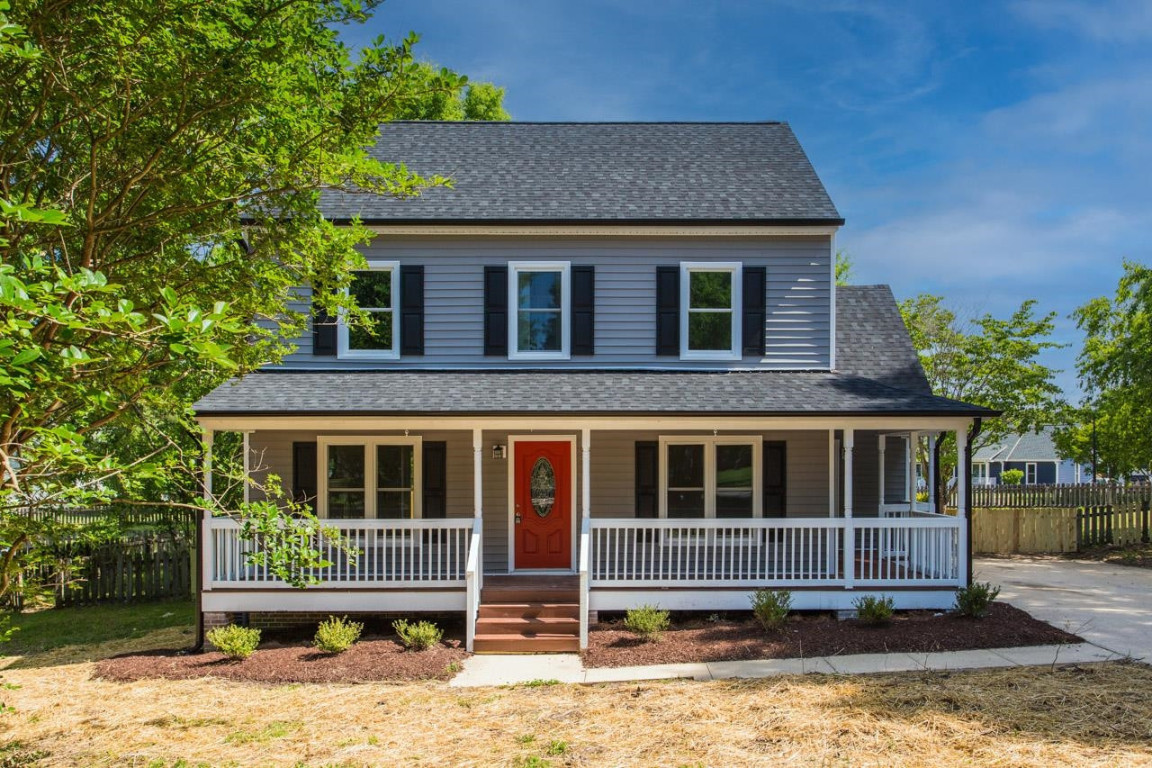 Undisclosed Address Wake Forest, NC 27587 - Photo 1 of 26 a house view with a garden space