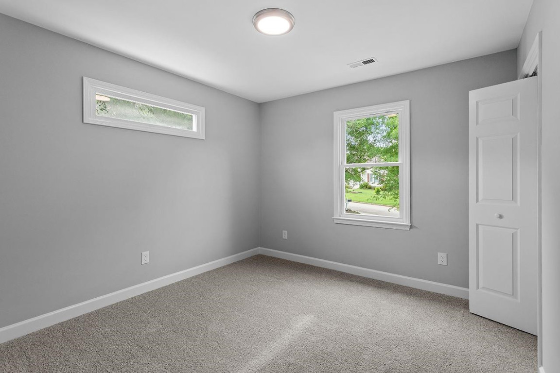 Undisclosed Address Wake Forest, NC 27587 - Photo 17 of 26 an empty room with windows