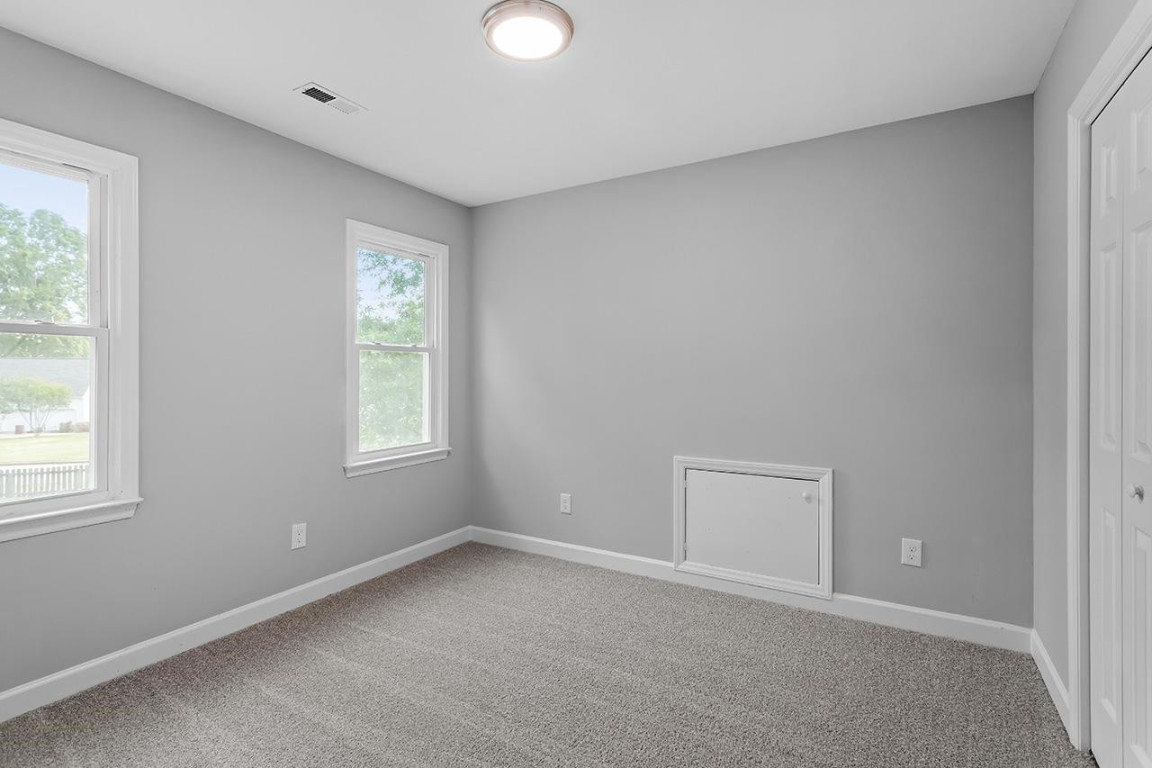 Undisclosed Address Wake Forest, NC 27587 - Photo 18 of 26 an empty room with a window