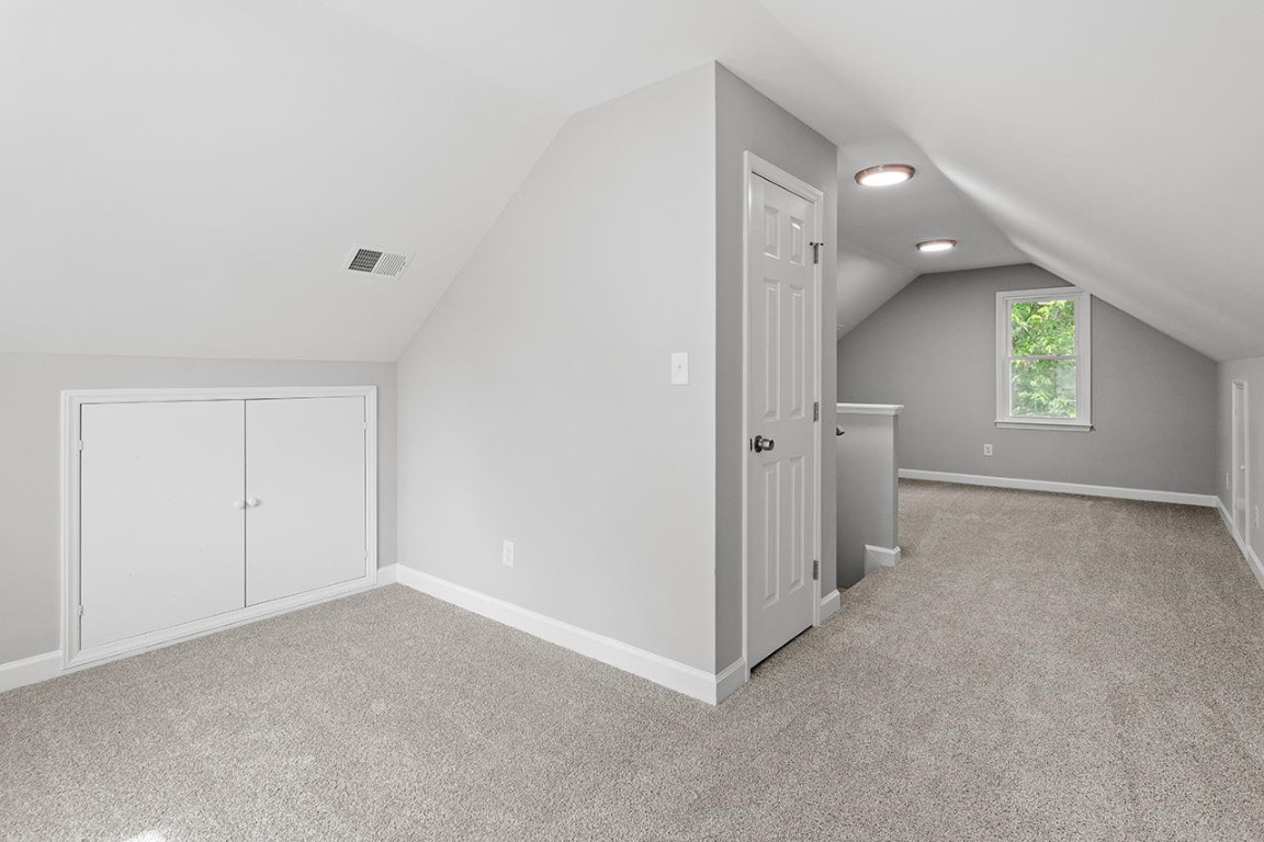 Undisclosed Address Wake Forest, NC 27587 - Photo 22 of 26 an empty room with windows and closet