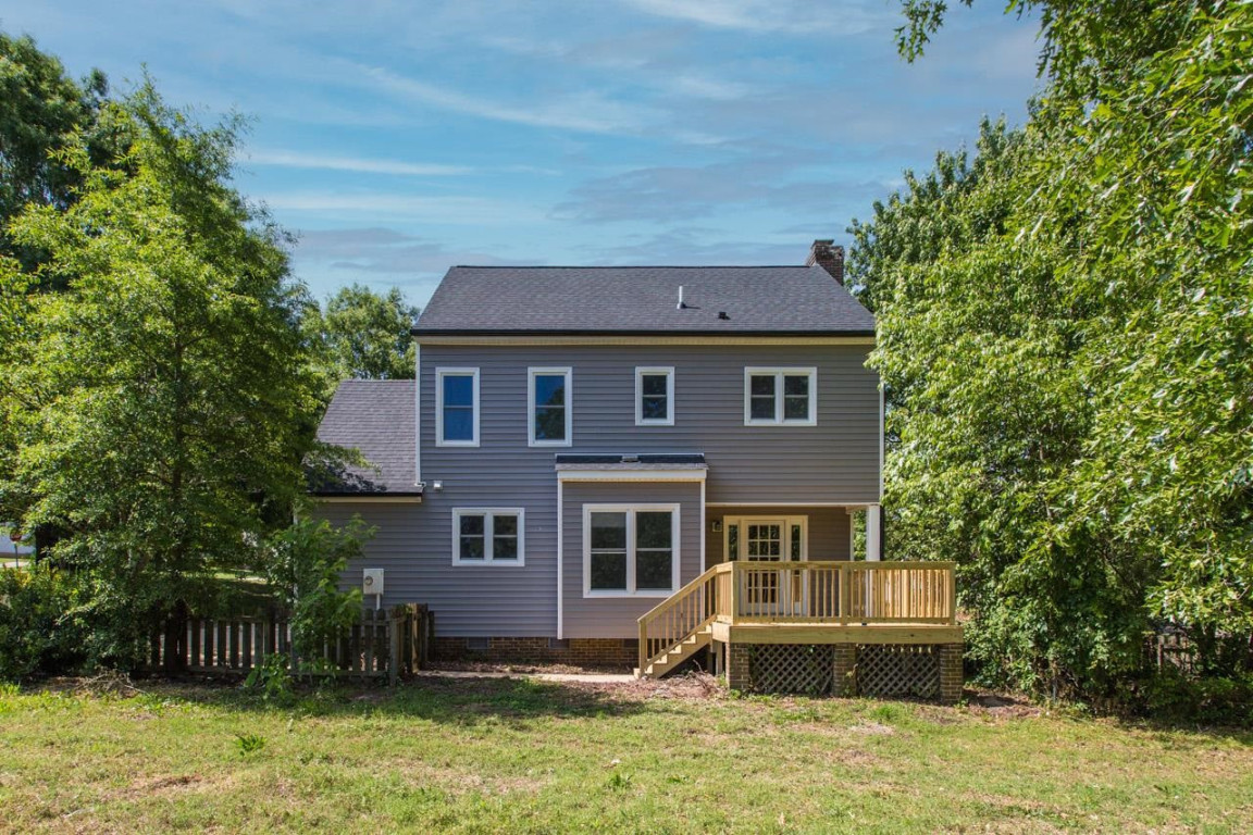 Undisclosed Address Wake Forest, NC 27587 - Photo 23 of 26 a front view of a house with a yard