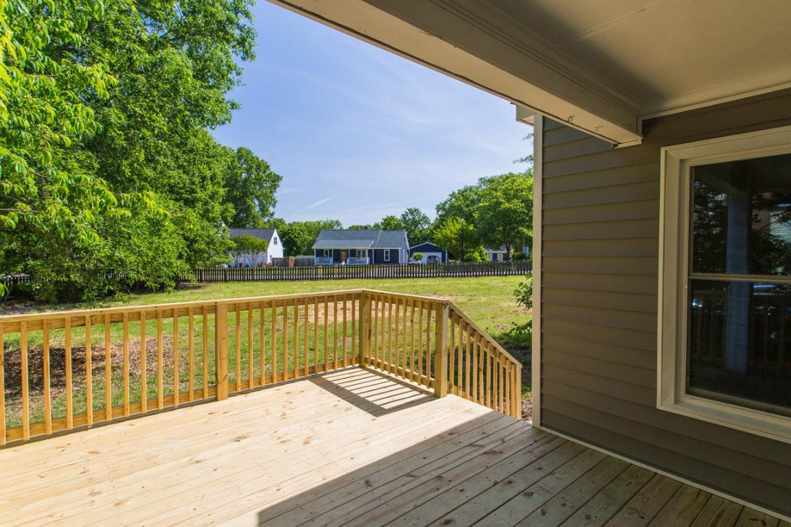 Undisclosed Address Wake Forest, NC 27587 - Photo 24 of 26 a view of balcony with wooden floor and fence