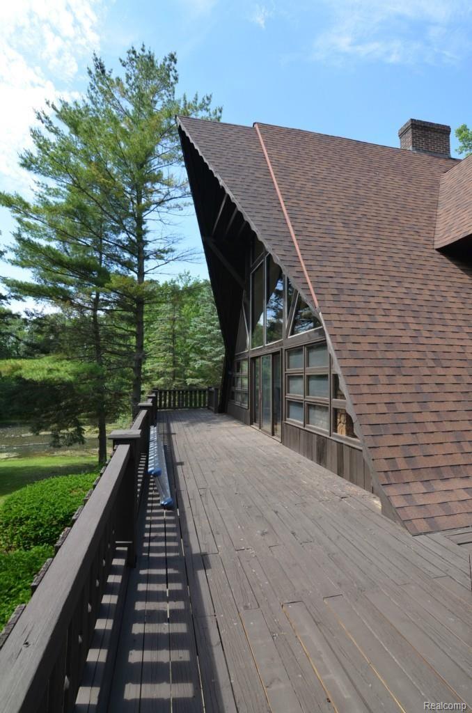 7365 Perryville Road Holly, MI 48442 - Photo 29 of 49 DECK OVERLOOKING POND